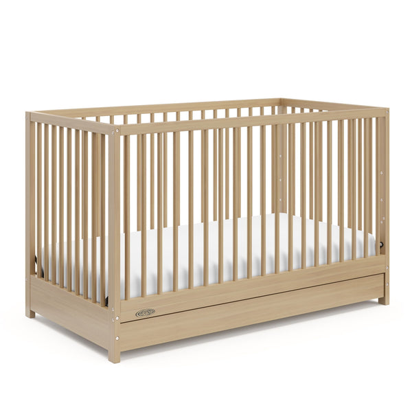 Graco Teddi 4-in-1 Convertible Crib with Drawer, Driftwood E0